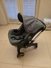 Seggiolino auto/trasportino/passeggino Doona