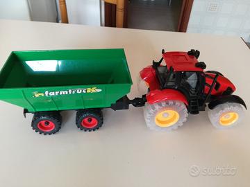 Trattore, camion e insabbiatrice