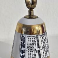 CAMPANELLA PORCELLANA CON CALENDARIO P. FORNASETTI