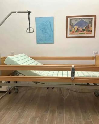letto ortopedico con sponde per disabili