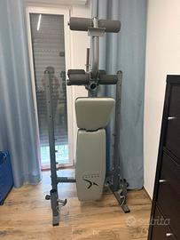 Panca multifunzione + 68 kg di pesi + 3 bilancieri