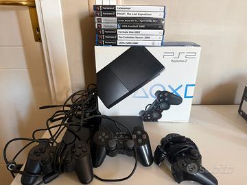 PS2 Slim + scatola + 3 controller + 7 giochi