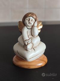 Angelo su Cuscino MORONI - Base in Vero Ulivo