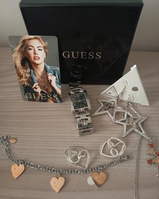 Orologio Festina e orecchini Guess 