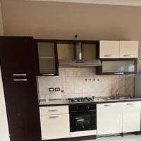 Cucina, frigorifero e lavatrice