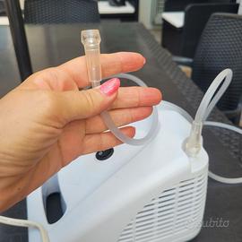 Apparecchio per areosol terapia