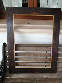 Cornice grande in legno