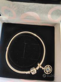 Nuovi: pendente bussola  e bracciale Pandora donna