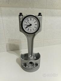 Orologio pistone