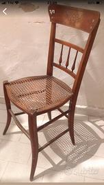 Due sedie in legno e paglia di vienna