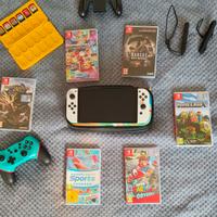 Nintendo Switch OLED White + 6 Giochi + Controller
