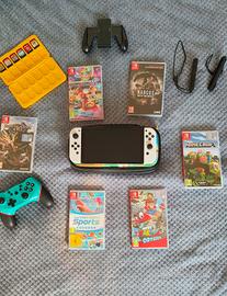 Nintendo Switch OLED White + 6 Giochi + Controller