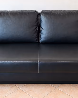Divano nero trasformabile con contenitore
