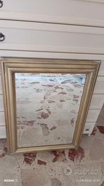 cornice in legno dorata con specchio 