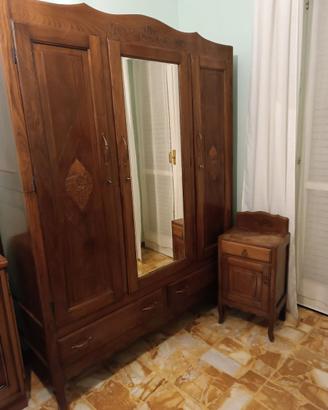 comodino guardaroba e testiera letto da una piazza