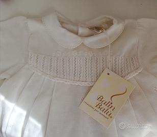 Vestitino in cotone con ricami per neonata