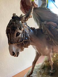 Contadino su asino in ceramica statuetta