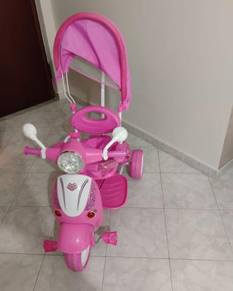 Triciclo bimba rosa con cappottina e maniglione