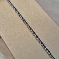 Bracciale tennis in oro bianco e diamanti neri