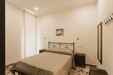 Camere in pieno centro