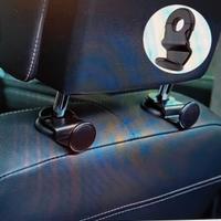 Ganci per appoggiatesta