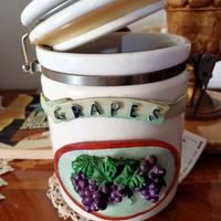 Barattolo di ceramica porta biscotti con cucchiaio