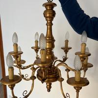 Antico lampadario in legno dorato
