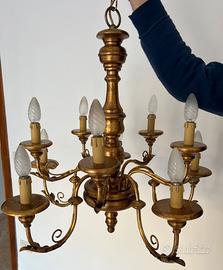 Antico lampadario in legno dorato