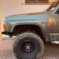 Cerchi e gomme da 33 nissan