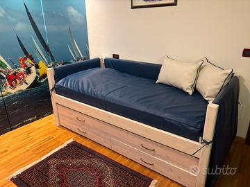 letto con cassettoni e secondo letto -divano