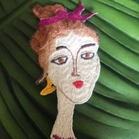 Toppa ricamata a mano