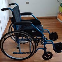 Carrozzina pieghevole per disabili