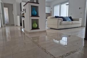 Luminoso quadrilocale con posto auto