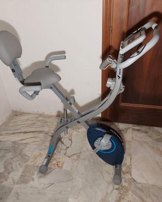 Cyclette con manubri elastici
