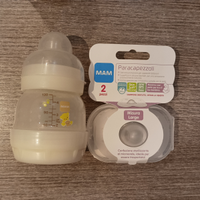 Paracapezzoli in silicone MAM nuovi, più biberon