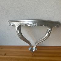 Mensola svuota tasche