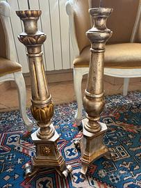 Antichi candelabri in legno