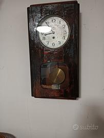 Orologio a pendolo antico