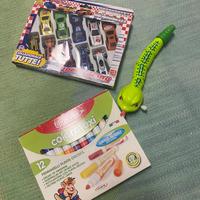 Tre giochi, macchinine, pennarelli , biscio