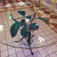 Tavolo in vetro e ferro battuto