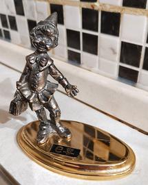 Statuina Pinocchio vintage metallo bagnato Argento