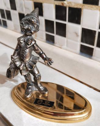 Statuina Pinocchio vintage metallo bagnato Argento