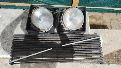 Fari tondi e mascherina Volvo 244/245 