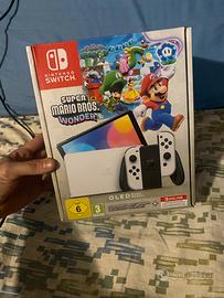 Nintendo switch oled più giochi e accessori