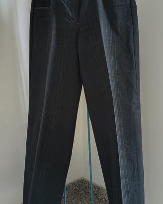 jeans a vita bassa con impunture