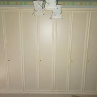 Armadio legno 7 ante.