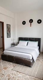 Letto contenitore e federa testiera nuova