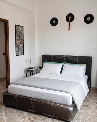 Letto contenitore e federa testiera nuova
