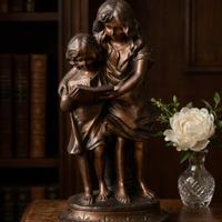 Statua femminile Art Nouveau in metallo