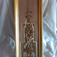 Fregio in legno, a bassorilievo con grottesca